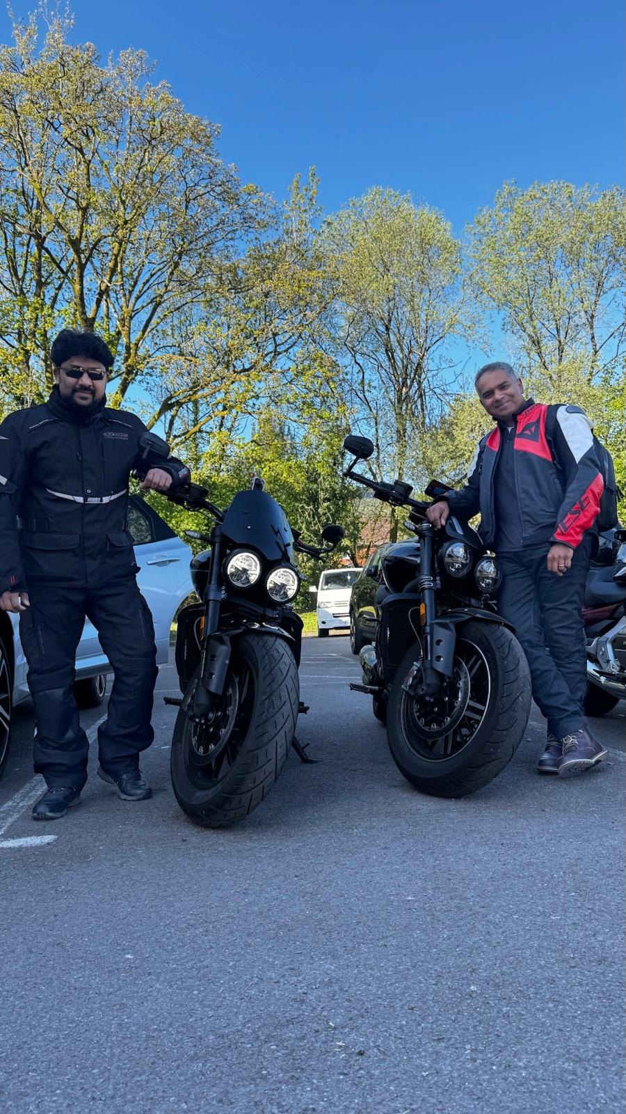 Two riders with their bikes on a spring ride