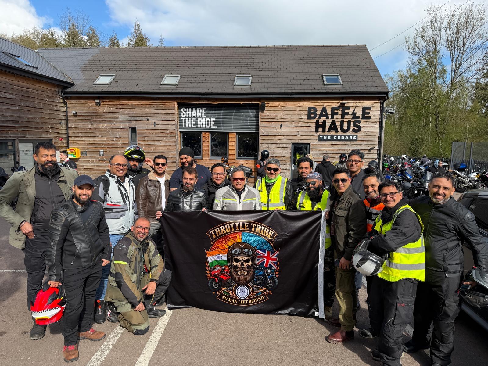 The Tribe with the club flag outside Baffle Haus